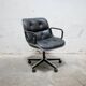 Black leather armchair by Charles Pollock for Knoll International