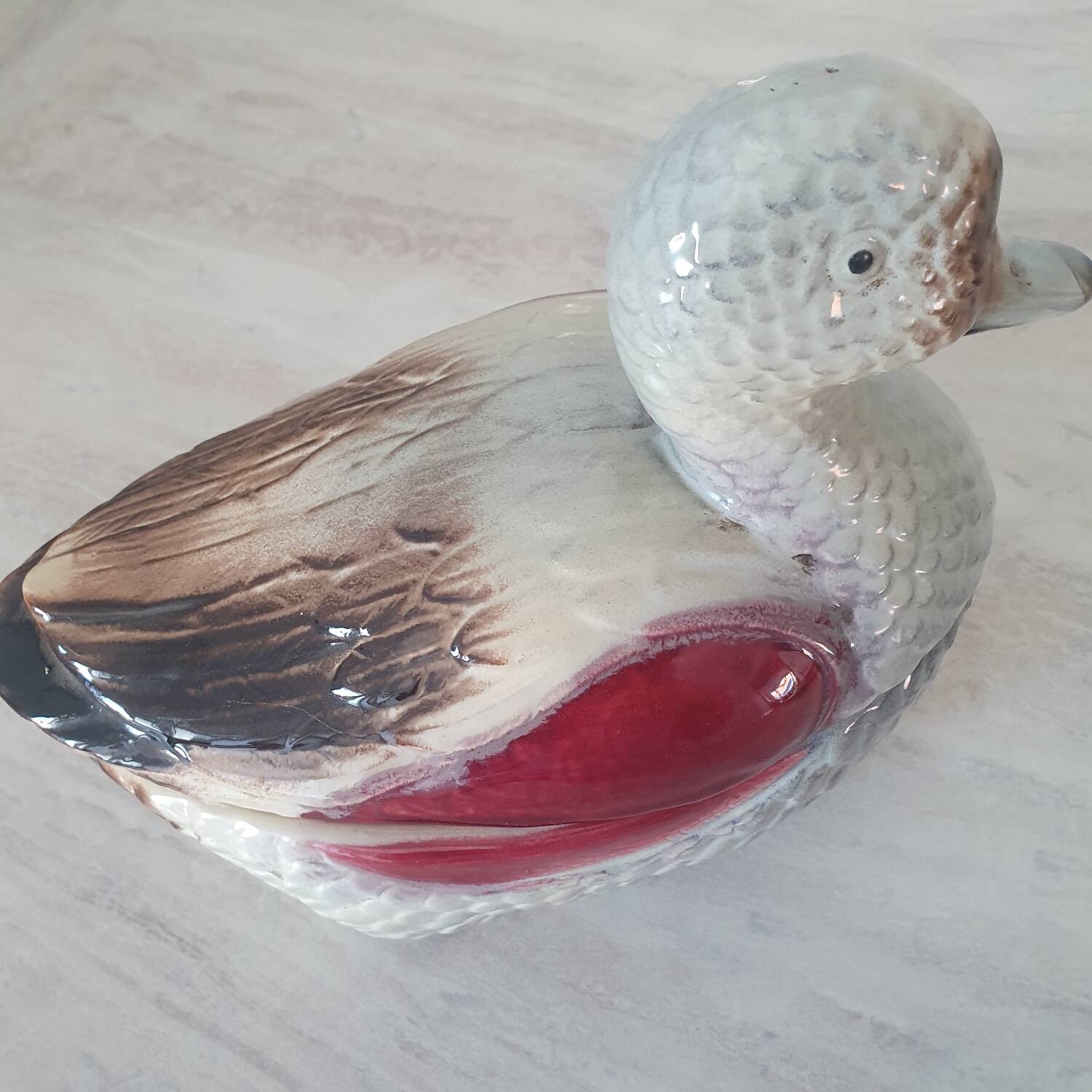 Duck-shaped slipware in the style of Michel Caugant.