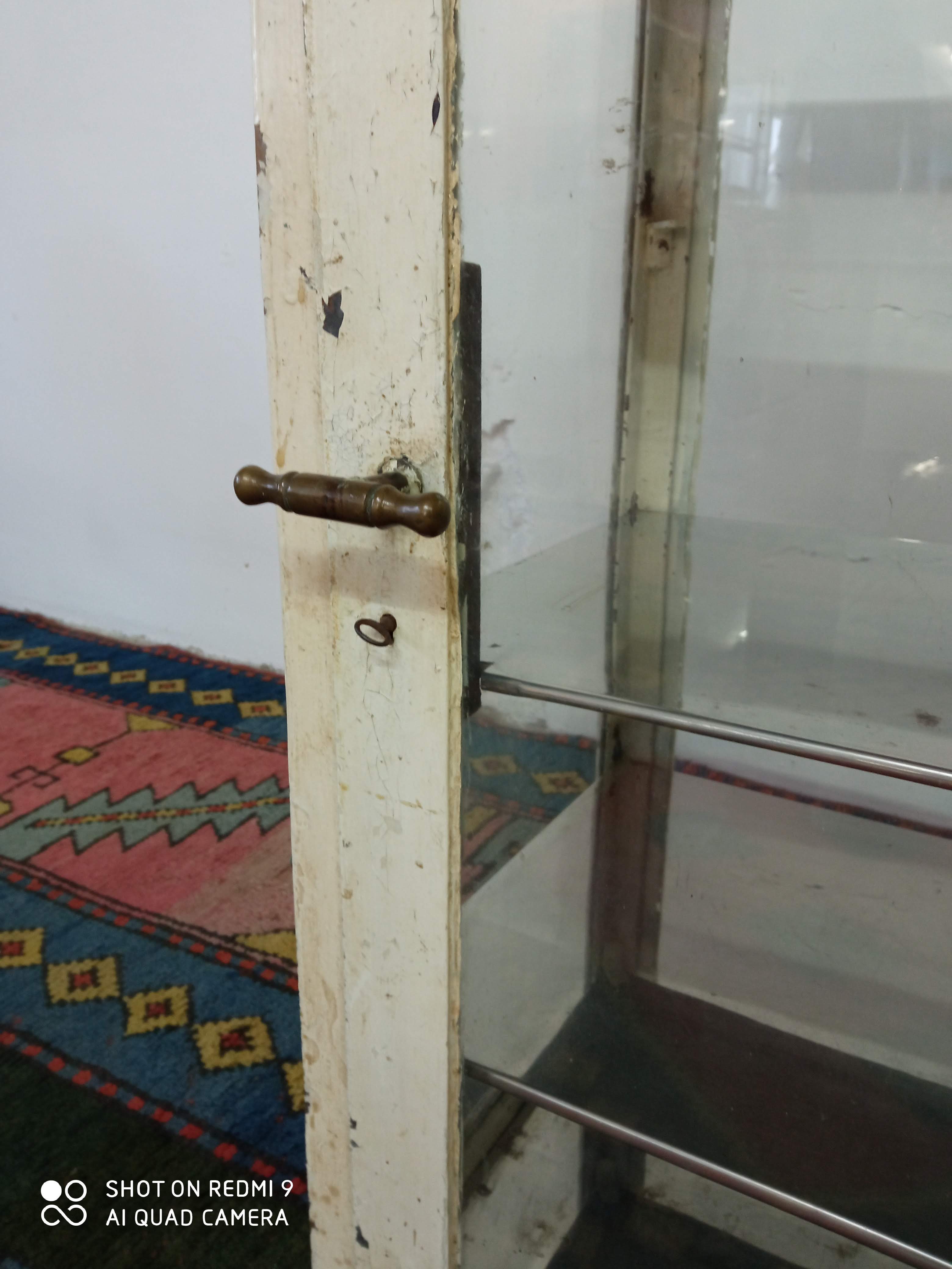 Ancient medical showcase in metal