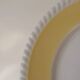 Vintage yellow butter ceramic dinnerware set with swirl border.