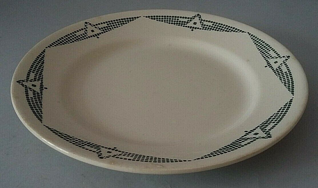 Flat plate in earthenware marked PB Limoges model Henri early XXth