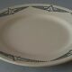 Flat plate in earthenware marked PB Limoges model Henri early XXth