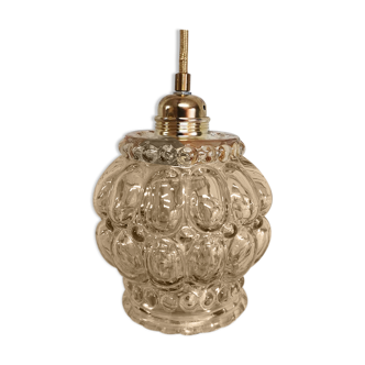 Old vintage hanging lamp stroller in moulded glass