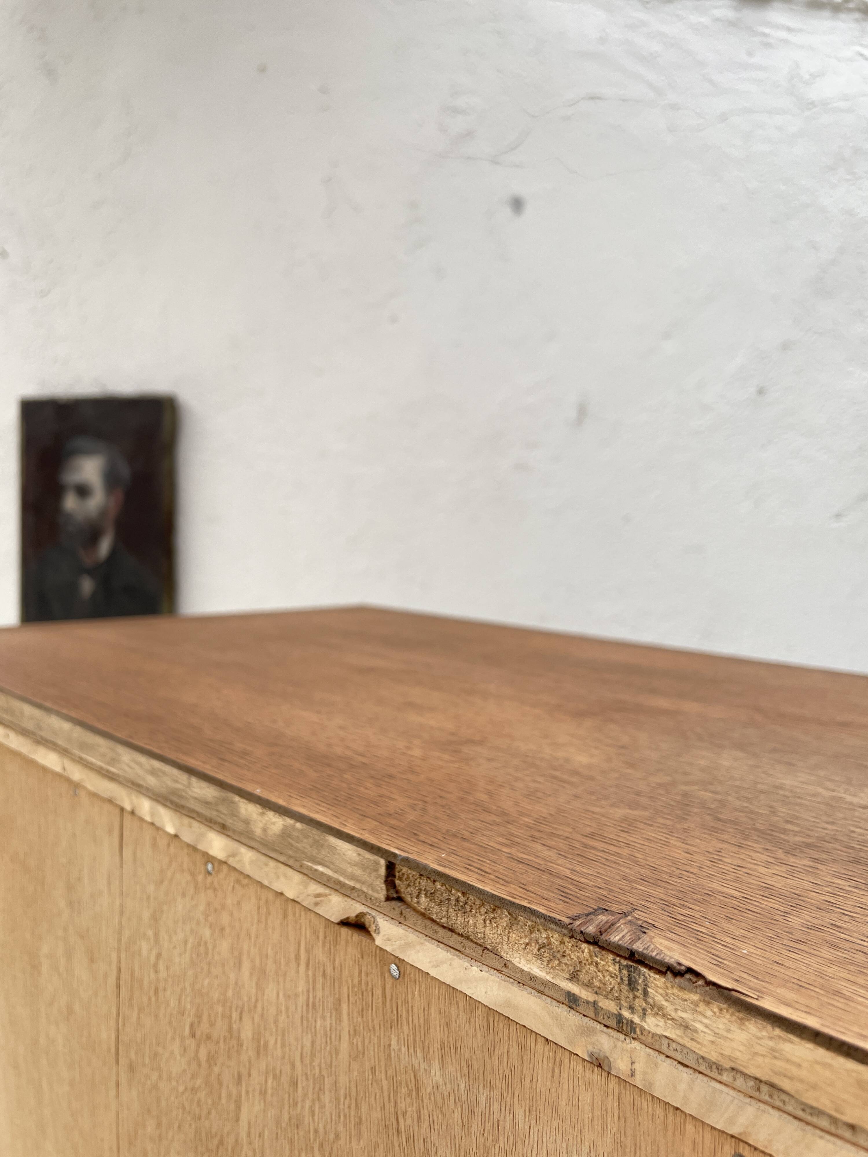Storage unit in solid oak and veneer, circa 1960.