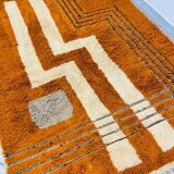 Modern Moroccan rug in rust wool with cream lines 150/250 cm