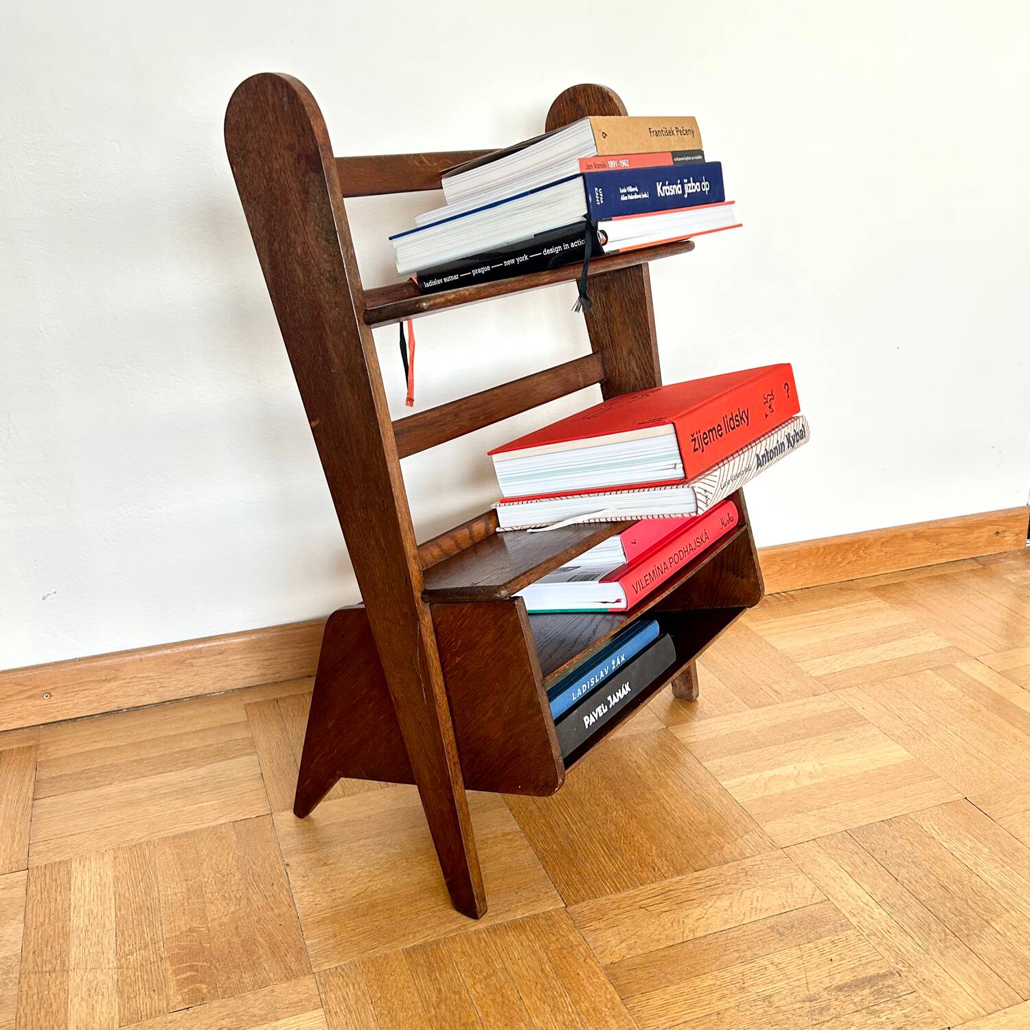 Handheld/carry-on bookcase, design A. Bocek for Krasna Jizba, Czechoslovakia, 1949