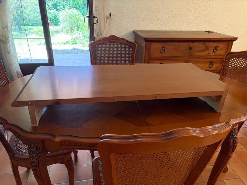 Oval table in Louis XV style and chairs