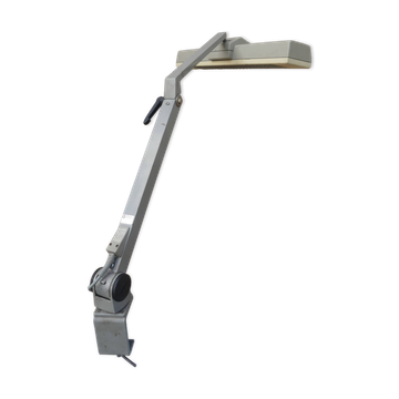 WALDMANN articulated workshop lamp with two industrial clamp arms for architects.