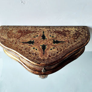 Small golden florentine console