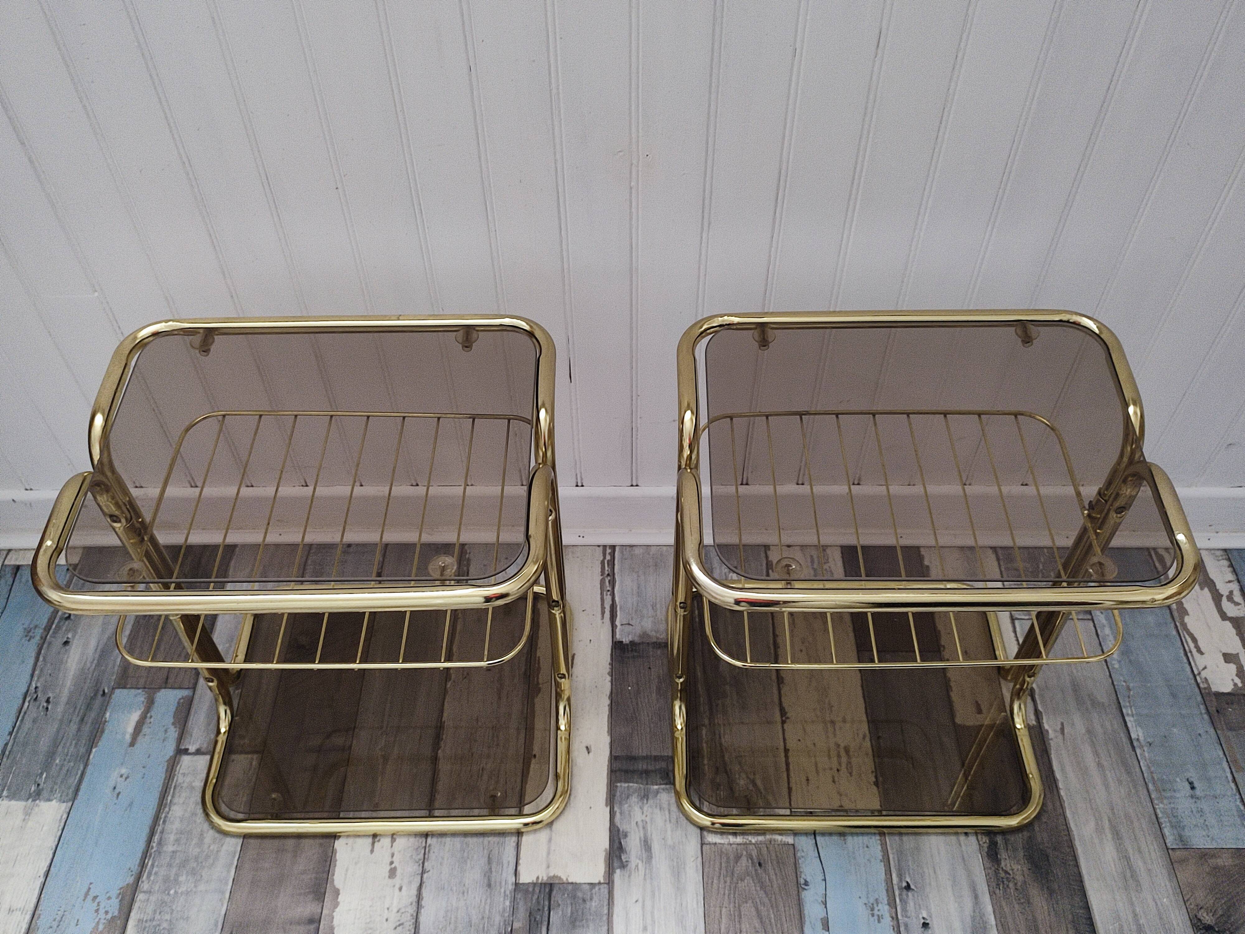 Pair of vintage smoked glass and brass bedside tables