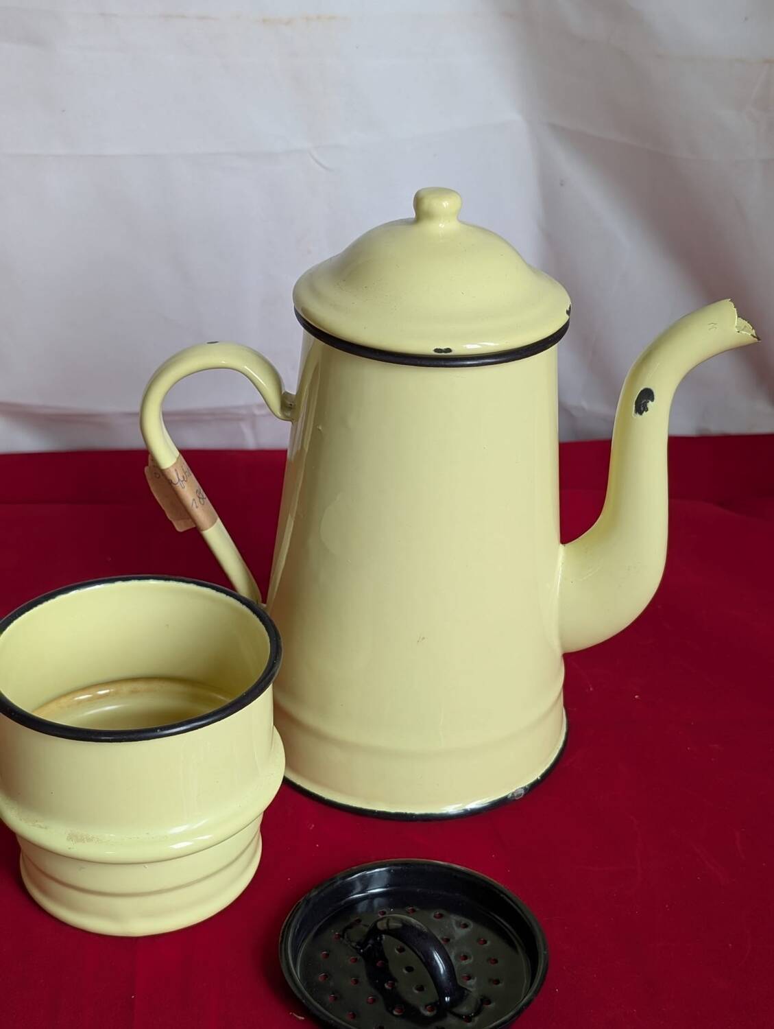 Yellow enameled metal coffee pot