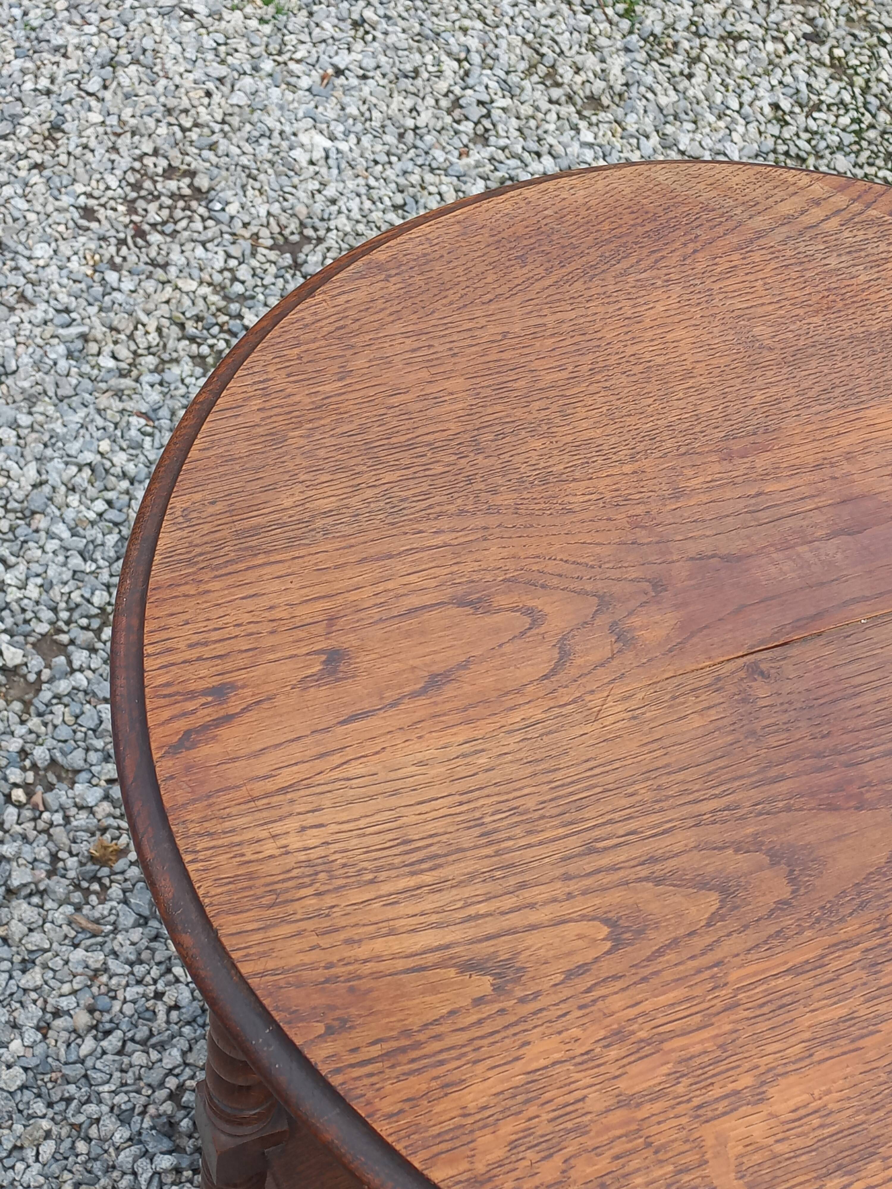 Vintage oak pedestal table with 3 shelves from the 60s