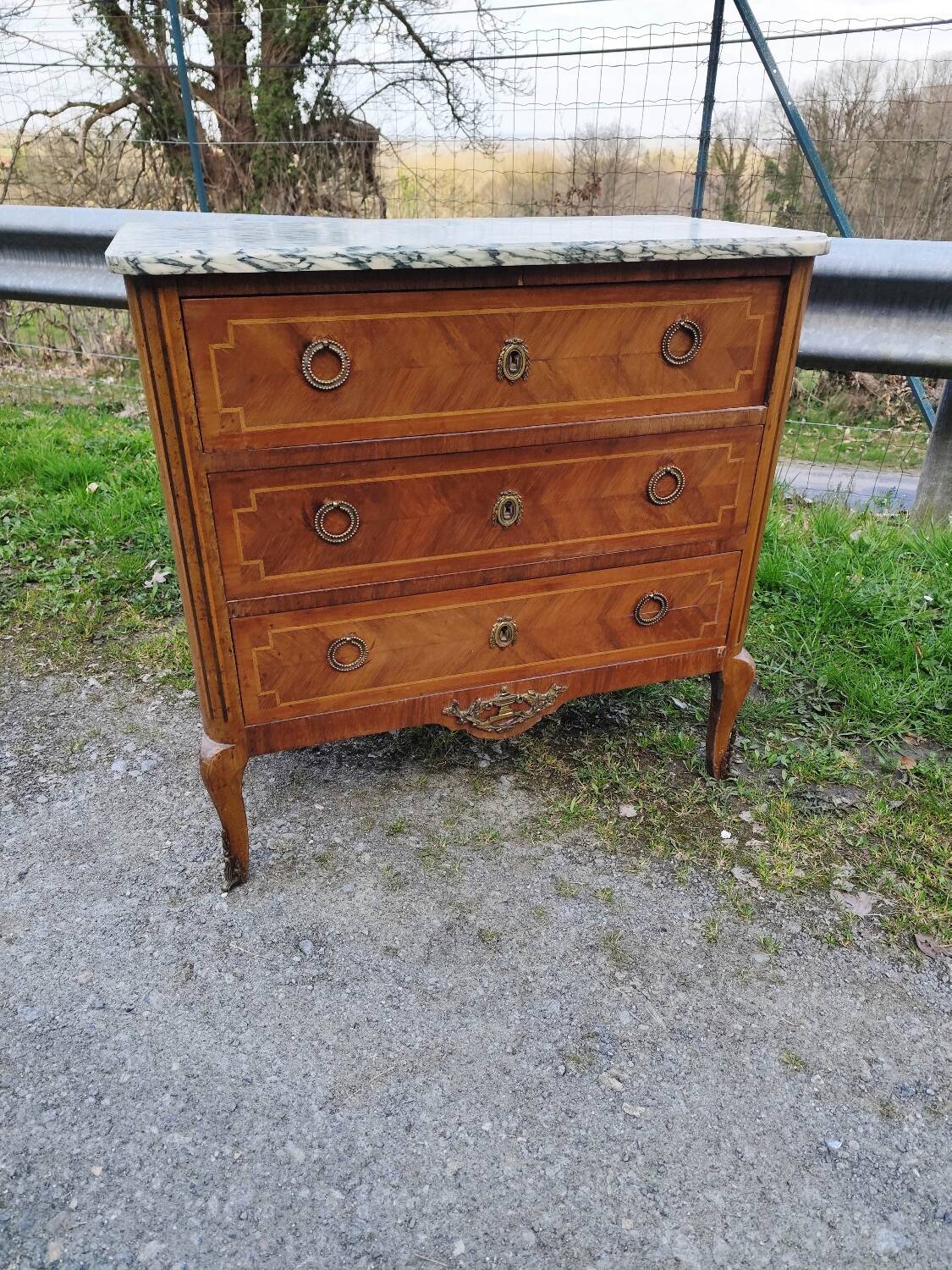 Louis XV, Louis XVI transitional style chest of drawers in marble and wood marquetry