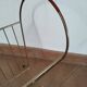 Golden magazine rack