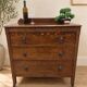 Antique chest of drawers on wheels with wood carving (key top drawer)