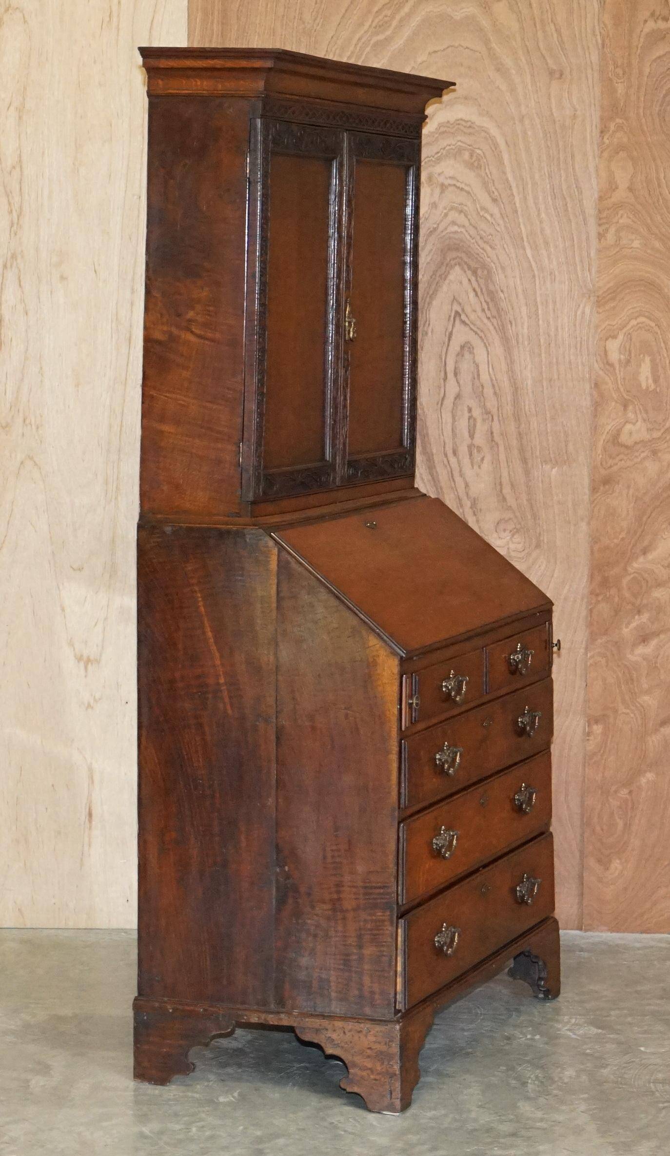 George III oak secretary bookcase circa 1760, Thomas Chippendale style.