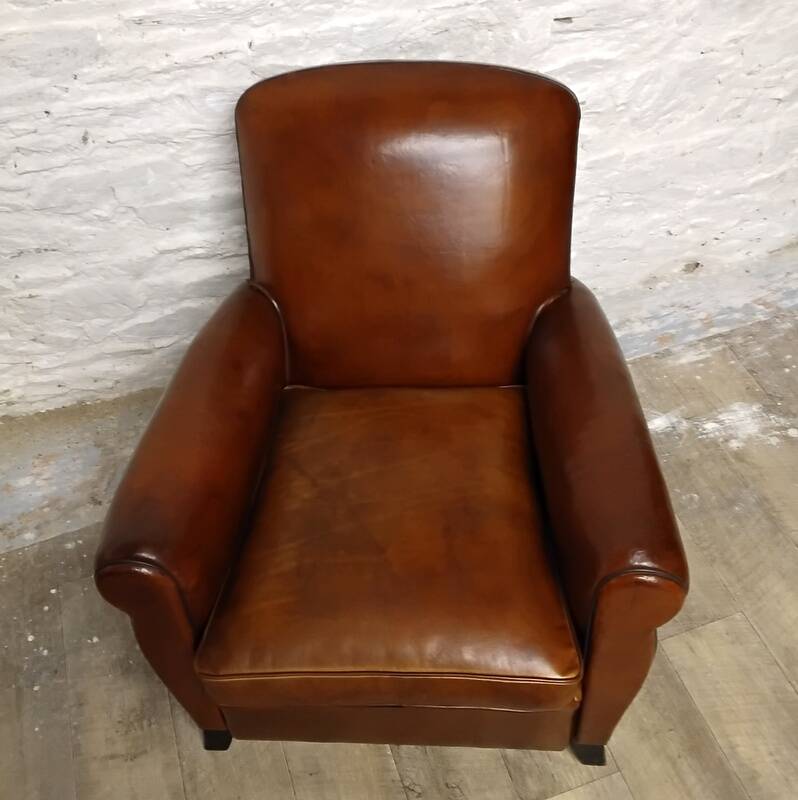 Restored horsehair club chair with curved back