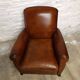 Restored horsehair club chair with curved back