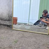 Miroir style vénitien à décor gravé et encadrement doré