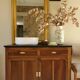 Vanity unit in solid walnut and Zimbabwean granite.