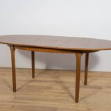 Mid-century extendable oval teak dining table from McIntosh, UK