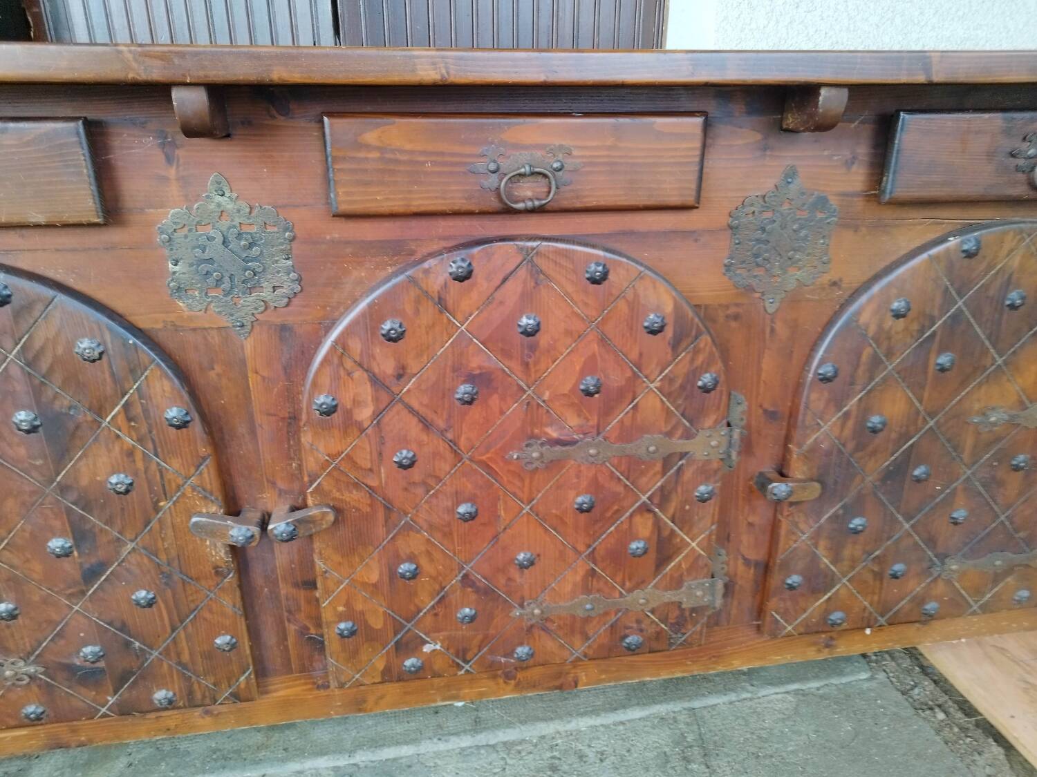 Solid wood sideboard with forged locks
