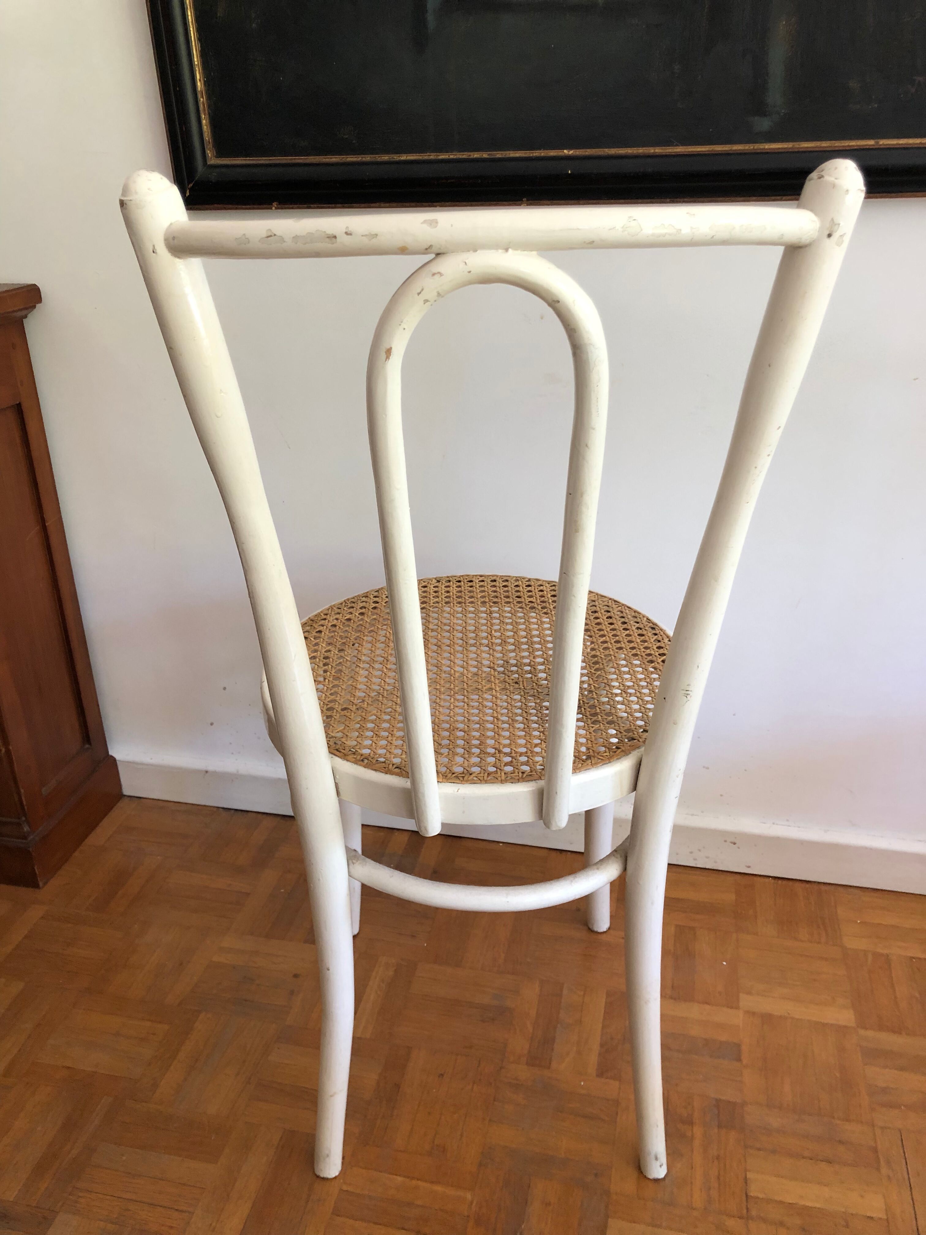 Four vintage bistro chairs