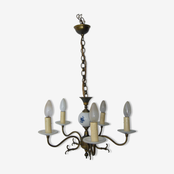 Brass chandelier and Dutch-style earthenware. Vintage