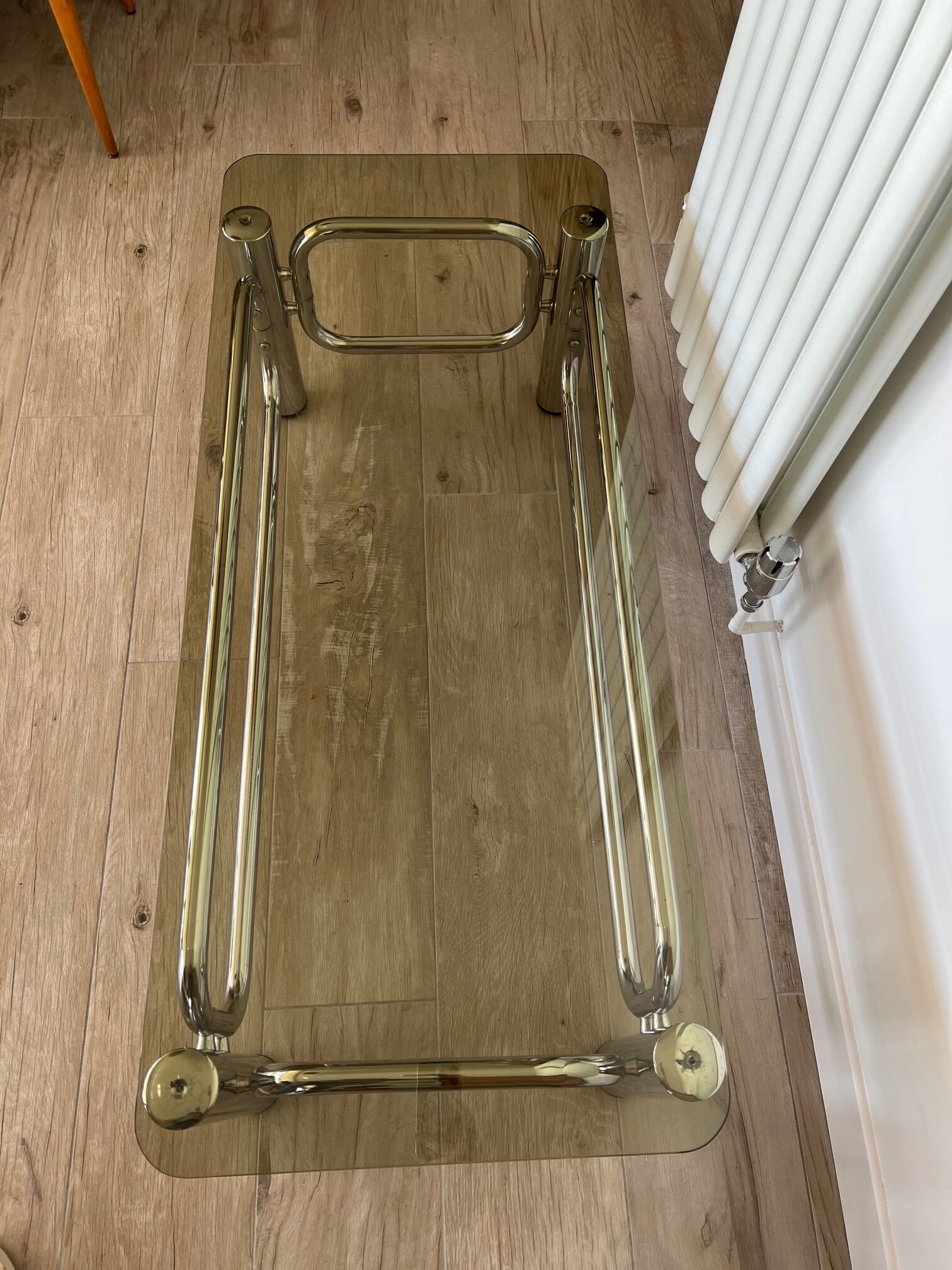 Coffee table in chrome and smoked glass