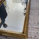 Vintage gold baroque mirror from the 1970s.