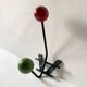 Small double coat hook in metal and wood painted green and red, 1950s-60s