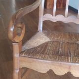 antique cherry and straw armchair with cathedral back