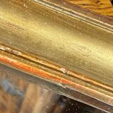 Antique mirror in gilded wood