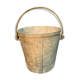 Ancient metal garden bucket