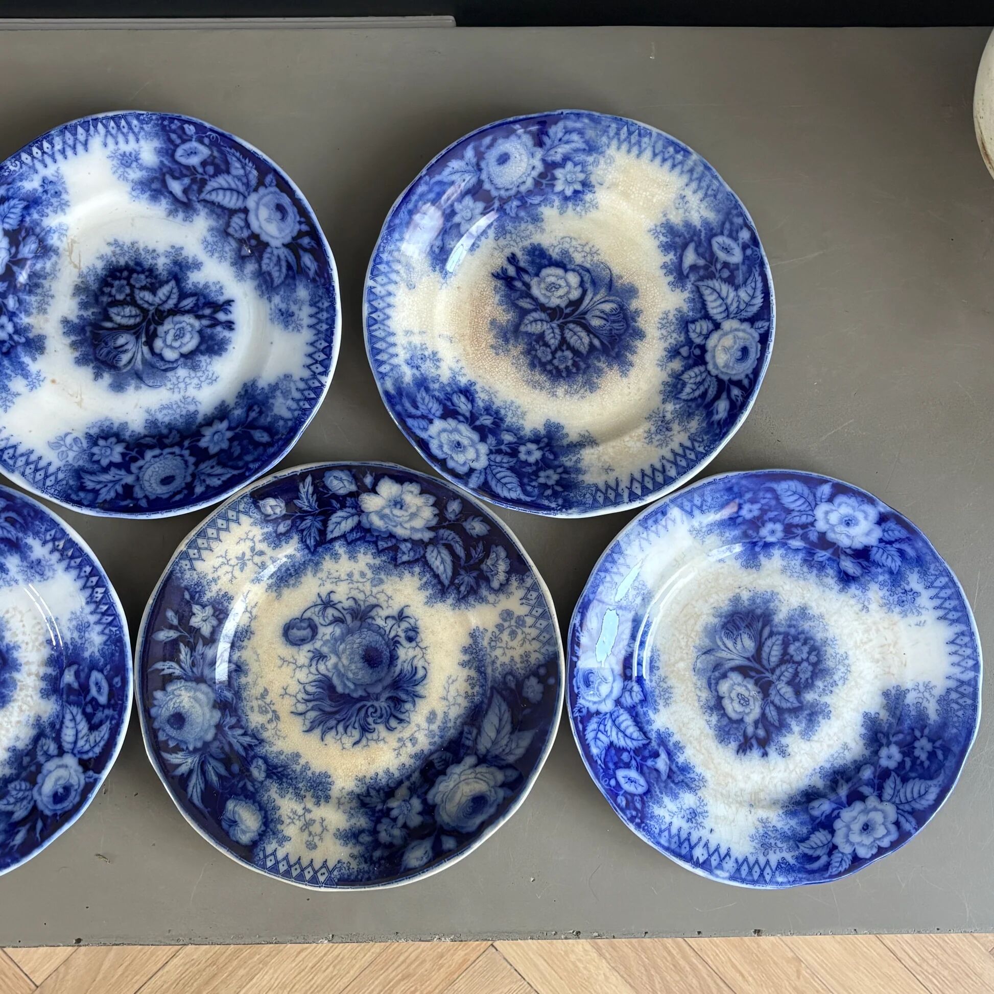 Stack of Sarreguemines plates, jardinière model.