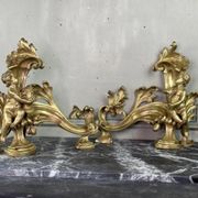 Paire de chenêts en bronze ciselé et doré d'après un modèle de Jacques Caffieri, Paris XIXème