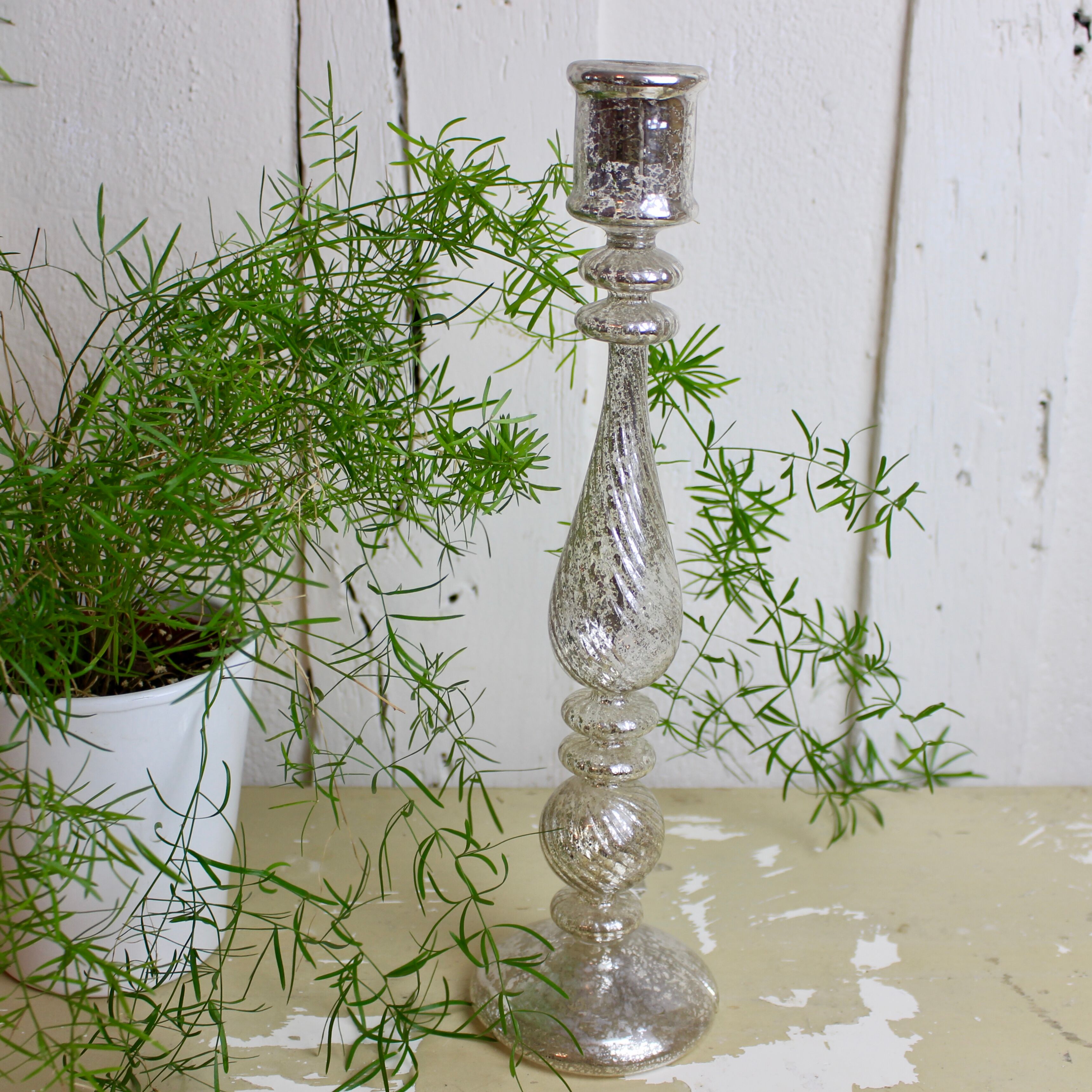 Former mercurise glass candlestick