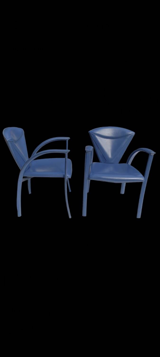 Armchairs covered in vintage blue leather