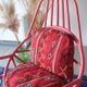 Restored vintage 70s armchair with custom-made Moroccan cushions, pink and red armchair
