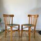 Pair of bistro chairs in light curved wood and green seat 1950s