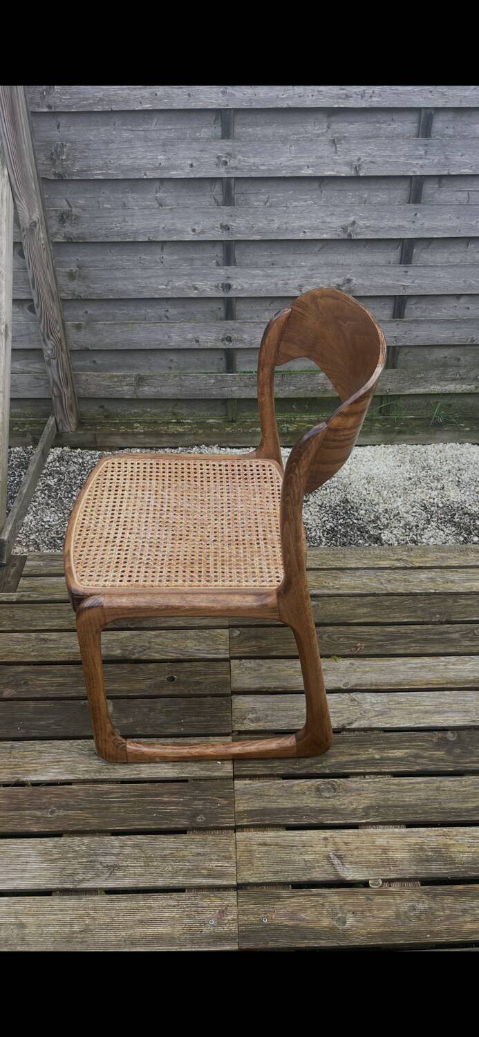 4 magnificent Baumann sled chairs, with caning.