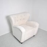 Fauteuil à oreille en bouclette
