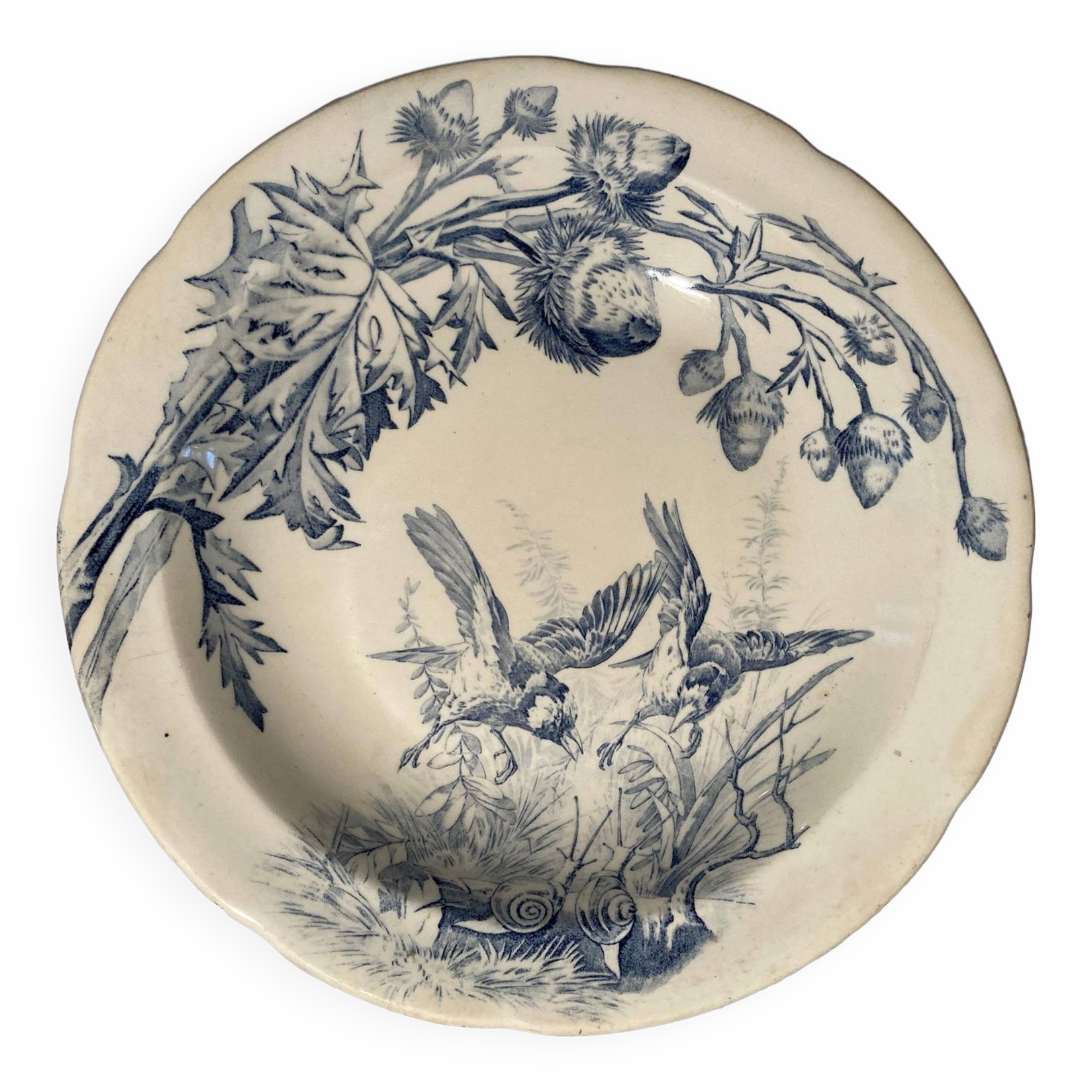 Plat rond en terre de fer, Clairefontaine, modèle Chardon, fin XIXe