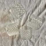 Pair of wall sconces in gilded brass and textured glass