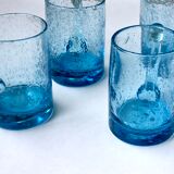 Four Biot glass mugs blue bubbled glass