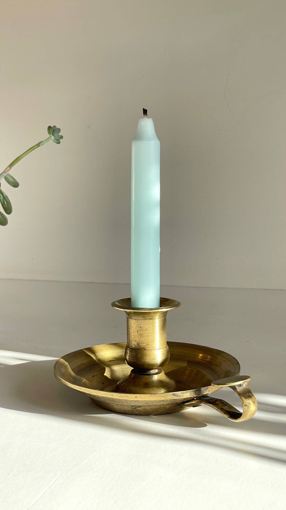 Antique solid bronze hand candlestick