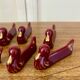 Set of 8 vintage slip knife holders in the shape of red ducks and