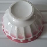 Ancient bowl in pink and white earthenware