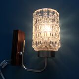 Round wall lamp in molded glass