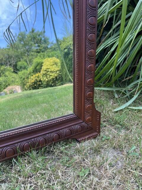 Antique carved wooden mirror